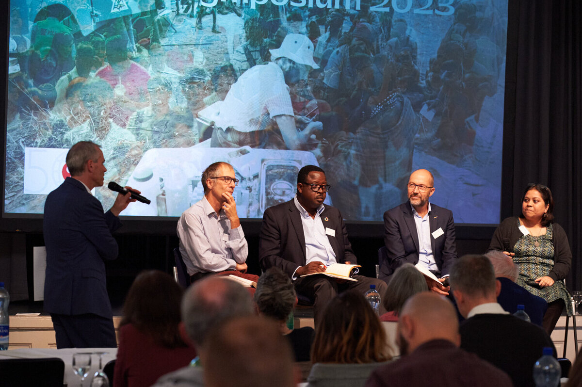 Panel Discussion with Kaspar Wyss (Swiss TPH); Itai Rusike (CWGH/MMI); Lorenz Indermühle (FAIRMED); Sulakshana Nandi (WHO Europe). Photo: Christoph Engeli / © Network Medicus Mundi Switzerland