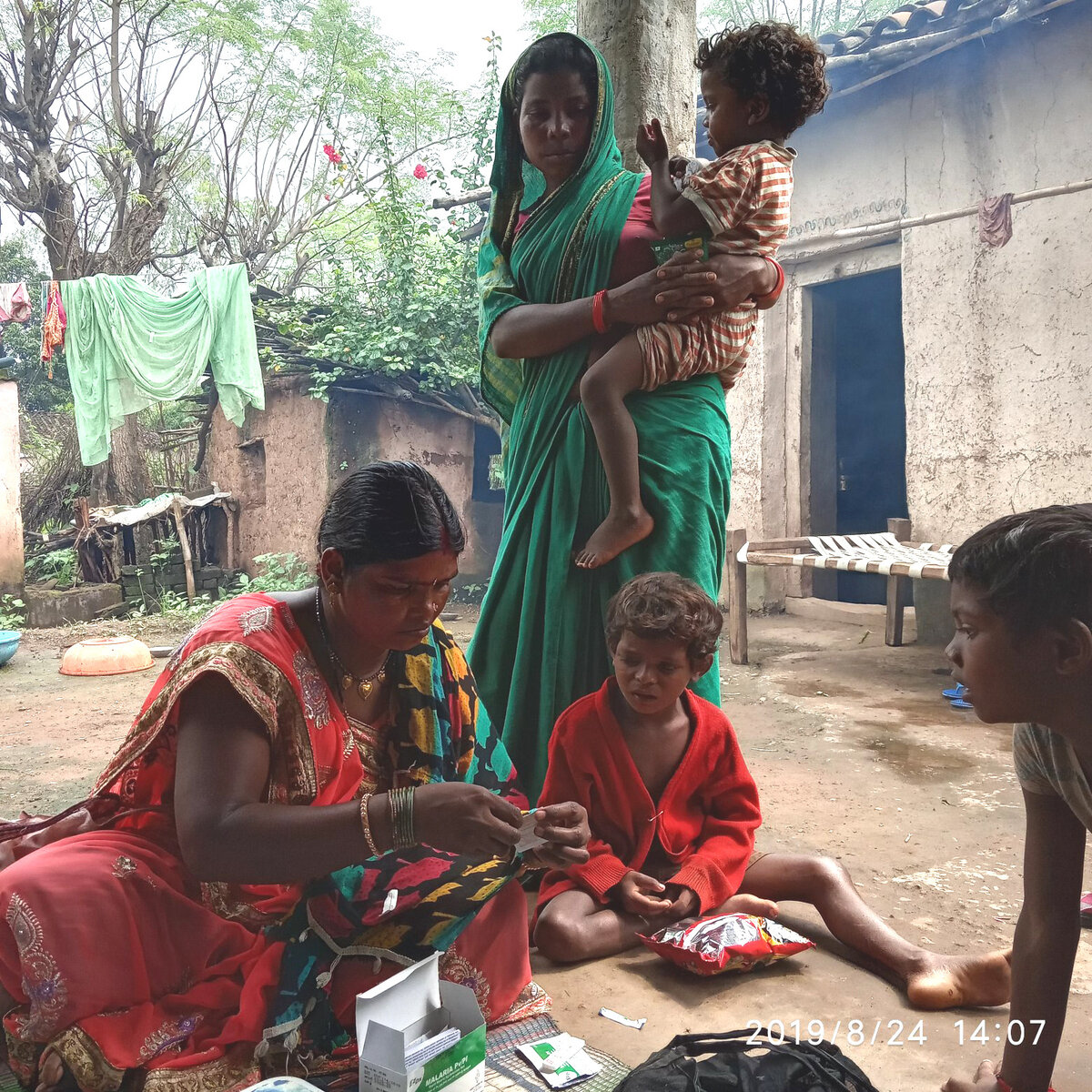 Mitanin conducting Malaria test through a rapid test kit in Kabirdham, Chhattisgarh. Photo: © Deepika Joshi