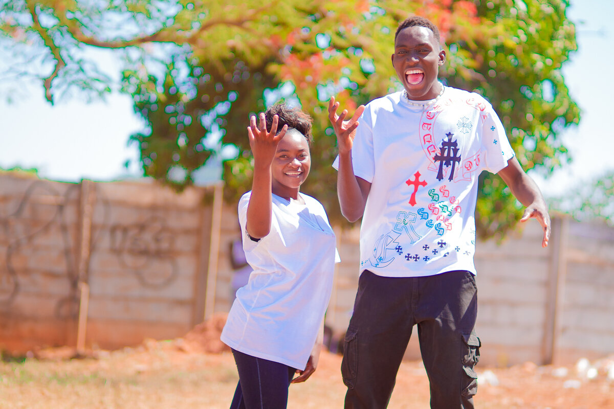 Two dynamic peer educators passionate about connecting their peers to the support they need. Photo: © Winston Musorowembudzi