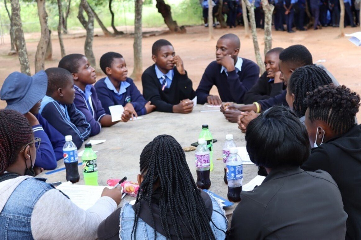 Adolescents discuss issues during a FGD of the baseline survey, March 2023. Similar meetings take place monthly in the supported communities where adolescents discuss future interventions. Photo: © Rudo Mandabva